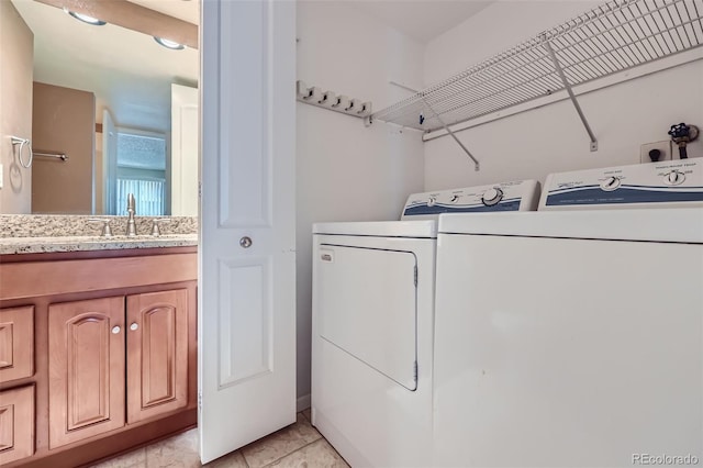 washroom with washer and dryer
