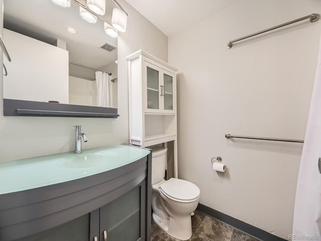 835 Knox Ct, Denver, CO 80204 - full bathroom featuring toilet, a shower with curtain, vanity, visible vents, and baseboards