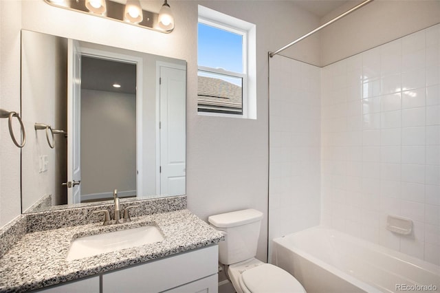 full bathroom with shower / bathtub combination, vanity, and toilet