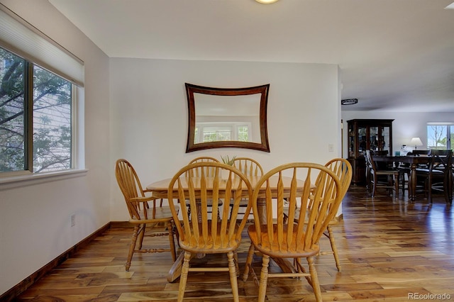 22739 E Prentice Pl, Aurora, CO 80015 - dining space featuring wood finished floors and baseboards