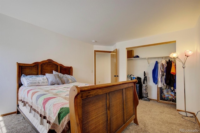 22739 E Prentice Pl, Aurora, CO 80015 - bedroom featuring light colored carpet, a closet, and baseboards