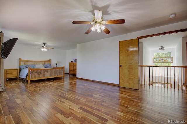 22739 E Prentice Pl, Aurora, CO 80015 - bedroom with wood finished floors and ceiling fan