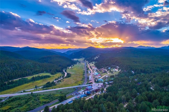 aerial view at dusk with a mountain view