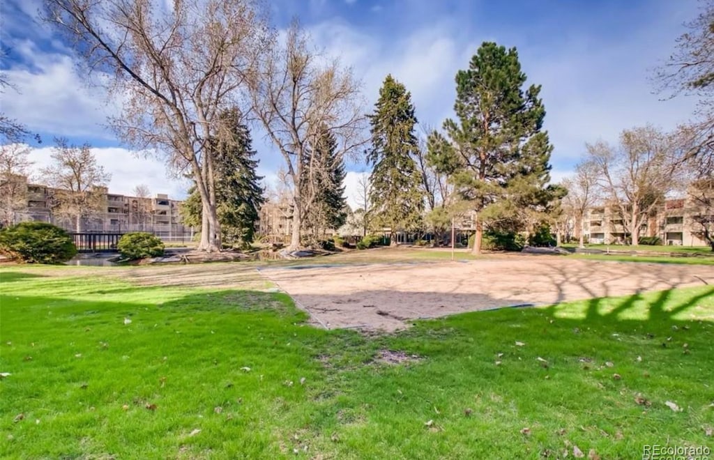 view of home's community featuring a yard