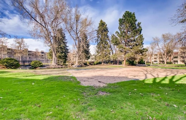 view of home's community featuring a yard