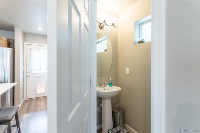 12743 Ulster St, Thornton, CO 80602 - bathroom with wood finished floors