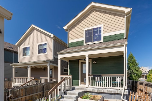 12743 Ulster St, Thornton, CO 80602 - view of front facade with covered porch and a shingled roof