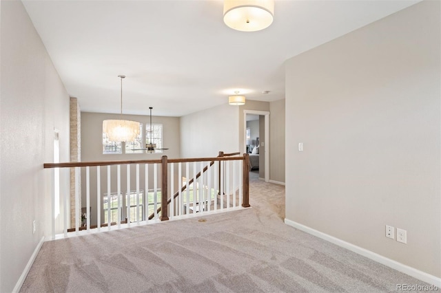 2559 S Kendrick St, Lakewood, CO 80228 - unfurnished room with baseboards, carpet flooring, and ceiling fan