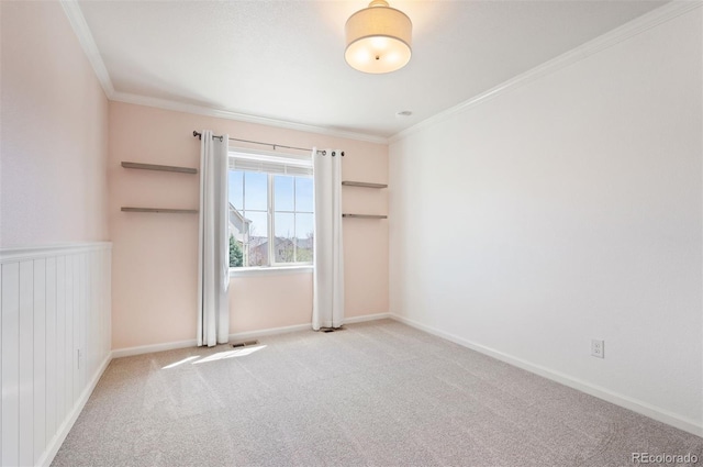 2559 S Kendrick St, Lakewood, CO 80228 - carpeted empty room with baseboards, visible vents, and ornamental molding