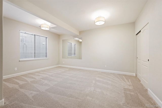 2559 S Kendrick St, Lakewood, CO 80228 - empty room with baseboards and light carpet