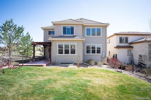 2559 S Kendrick St, Lakewood, CO 80228 - back of house with a lawn, stucco siding, fence, and a pergola