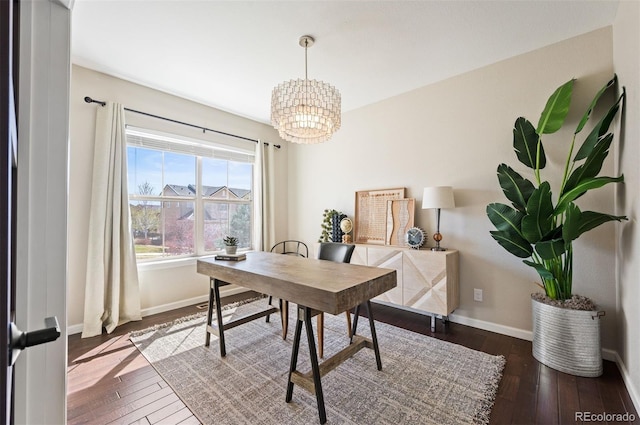 2559 S Kendrick St, Lakewood, CO 80228 - office space featuring baseboards, hardwood / wood-style floors, and a notable chandelier