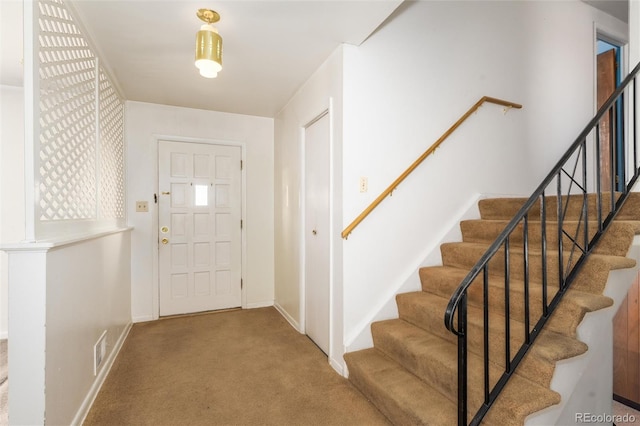 view of carpeted entryway