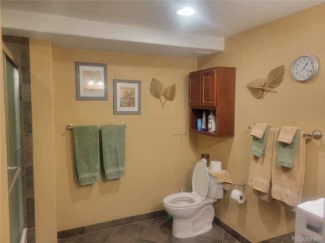 2190 S Holly St Unit 213, Denver, CO 80222 - bathroom with an enclosed shower, tile patterned floors, and recessed lighting