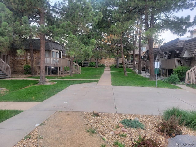 2190 S Holly St Unit 213, Denver, CO 80222 - surrounding community with stairs and a yard