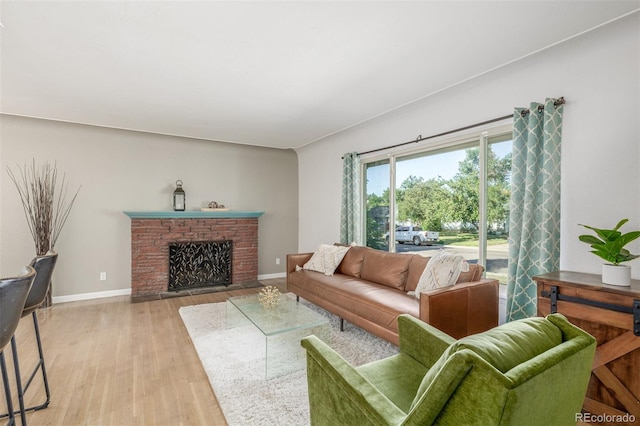 6273 S Prescott St, Littleton, CO 80120 - living room with light wood-style floors and a fireplace