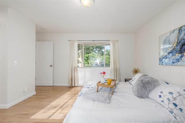 6273 S Prescott St, Littleton, CO 80120 - bedroom featuring wood finished floors and baseboards