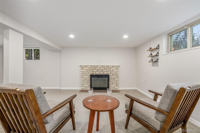 6273 S Prescott St, Littleton, CO 80120 - living area with light colored carpet, healthy amount of natural light, a fireplace with flush hearth, and recessed lighting