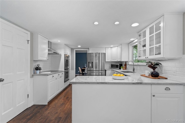 3966 S Magnolia Way, Denver, CO 80237 - kitchen featuring stainless steel appliances, a sink, backsplash, glass insert cabinets, and light stone countertops