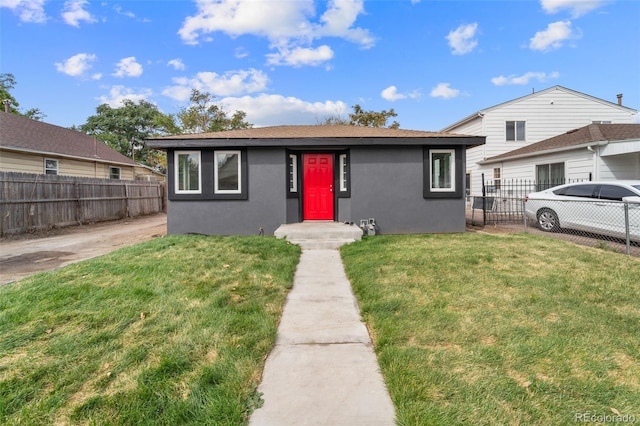 view of front of house with a front lawn