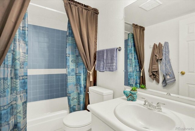 10211 Ura Ln Unit 101, Thornton, CO 80260 - bathroom with shower / tub combo with curtain and vanity