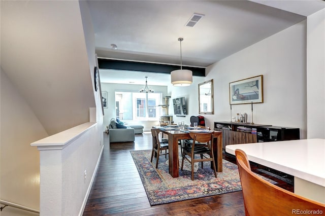 852 Kalamath St, Denver, CO 80204 - dining space featuring dark wood-style flooring and baseboards