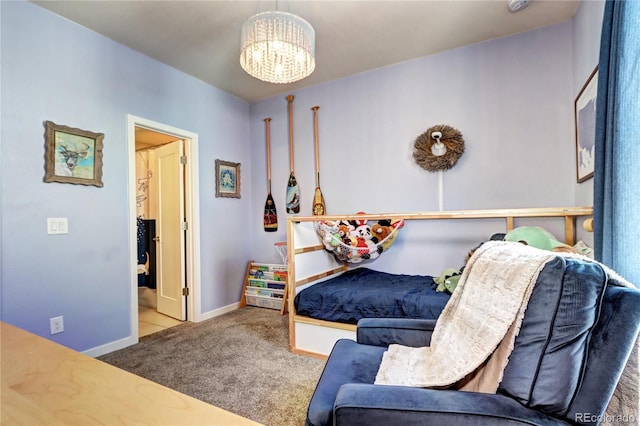 852 Kalamath St, Denver, CO 80204 - bedroom with a chandelier, carpet, and baseboards
