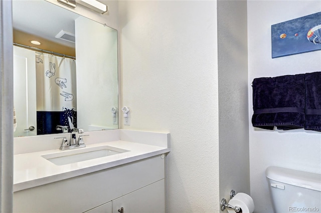 852 Kalamath St, Denver, CO 80204 - bathroom featuring toilet and vanity