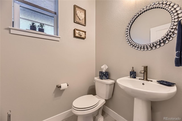 6211 Stable View St, Castle Pines, CO 80108 - bathroom with baseboards and toilet