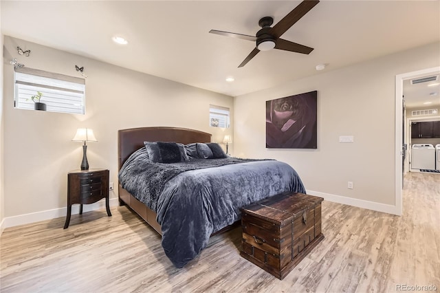 6211 Stable View St, Castle Pines, CO 80108 - bedroom with washing machine and dryer, light wood-style flooring, ceiling fan, and recessed lighting