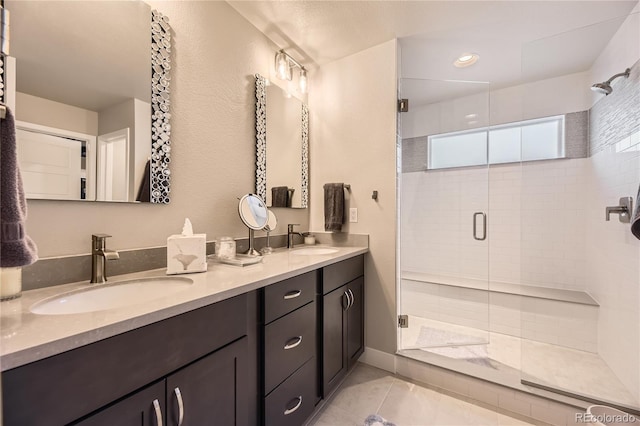 6211 Stable View St, Castle Pines, CO 80108 - full bath featuring a shower stall, double vanity, and tile patterned flooring