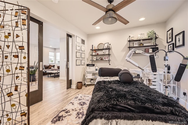 6211 Stable View St, Castle Pines, CO 80108 - bedroom with wood finished floors, recessed lighting, and a ceiling fan