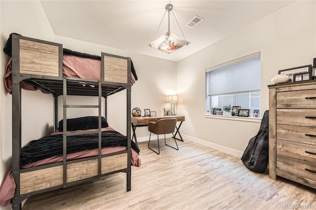 6211 Stable View St, Castle Pines, CO 80108 - bedroom featuring light wood-style floors and a desk