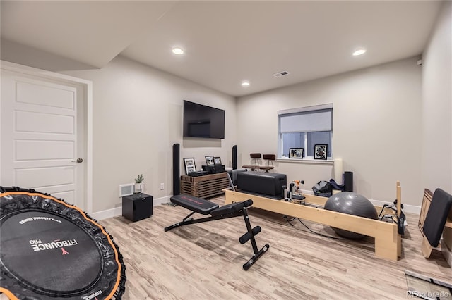 6211 Stable View St, Castle Pines, CO 80108 - workout room featuring wood finished floors and recessed lighting