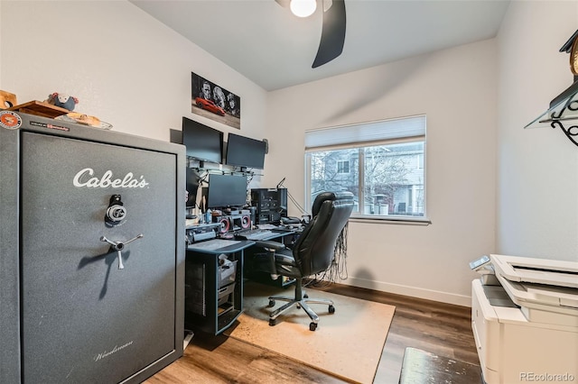 office featuring ceiling fan, baseboards, and wood finished floors