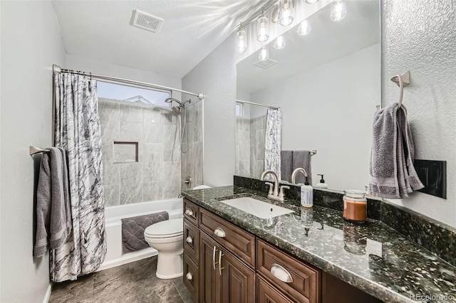 bathroom with toilet, visible vents, shower / tub combo with curtain, and vanity