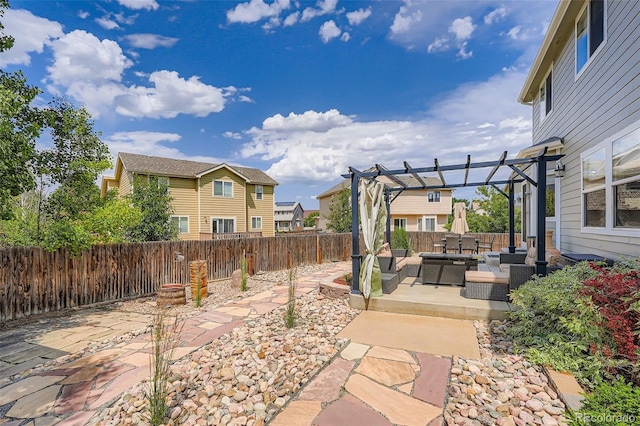 1793 E 164th Pl, Thornton, CO 80602 - fenced backyard with outdoor lounge area, a patio area, a pergola, and a residential view