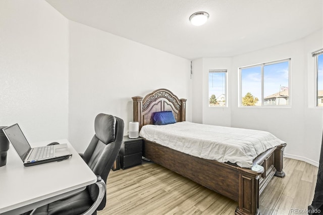 bedroom featuring light hardwood / wood-style floors