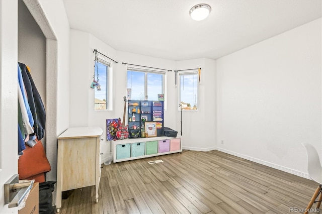 interior space with hardwood / wood-style floors