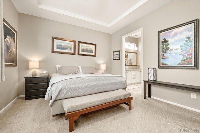3418 New Haven Cir, Castle Rock, CO 80109 - bedroom with light carpet, baseboards, connected bathroom, and a tray ceiling