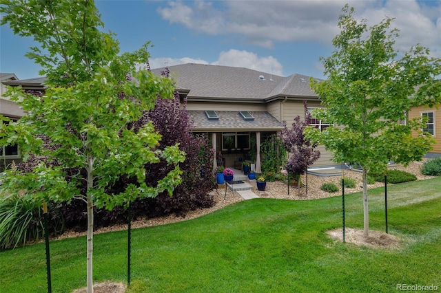 3418 New Haven Cir, Castle Rock, CO 80109 - rear view of house featuring a yard and roof with shingles