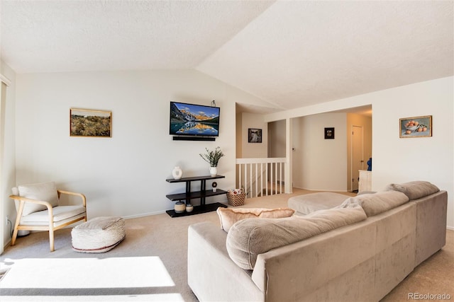 carpeted living room featuring lofted ceiling and a textured ceiling