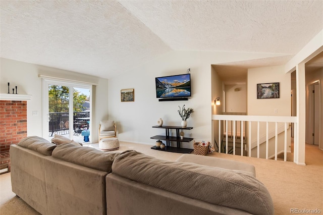 carpeted living room featuring lofted ceiling and a textured ceiling