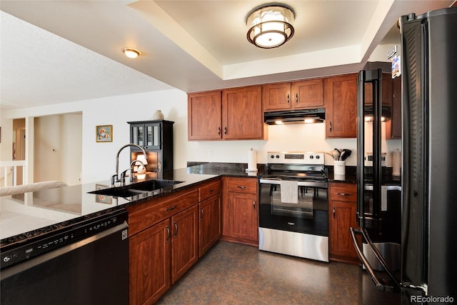 kitchen featuring sink, appliances with stainless steel finishes, kitchen peninsula, and a raised ceiling