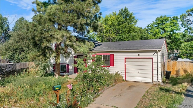 10463 Kipling Ct, Broomfield, CO 80021 - view of front of house with concrete driveway and a garage