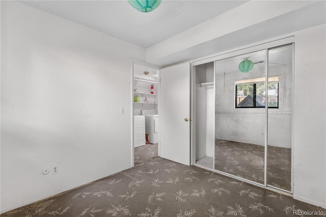 10463 Kipling Ct, Broomfield, CO 80021 - unfurnished bedroom with a closet, washer and clothes dryer, and carpet flooring