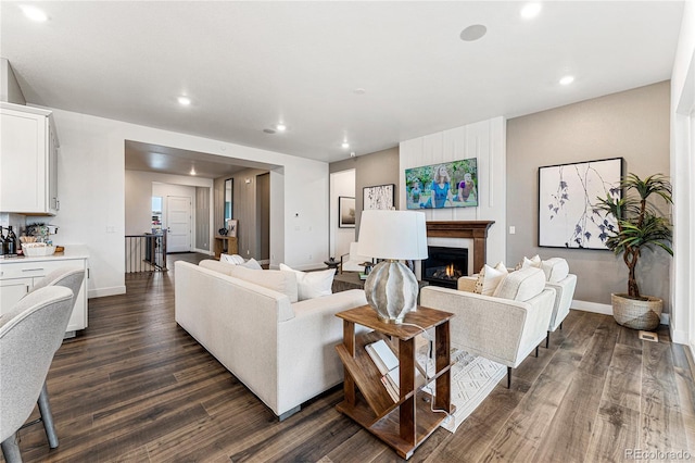 living room featuring dark hardwood / wood-style flooring