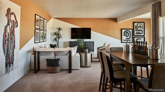 living room featuring beam ceiling and carpet flooring