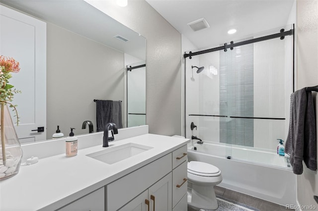 full bathroom with toilet, vanity, and enclosed tub / shower combo