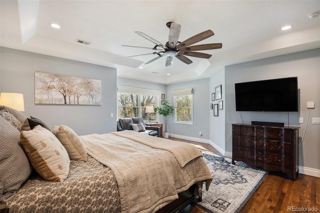 3002 S Oak Way, Lakewood, CO 80227 - bedroom featuring a tray ceiling, baseboards, wood finished floors, recessed lighting, and ceiling fan